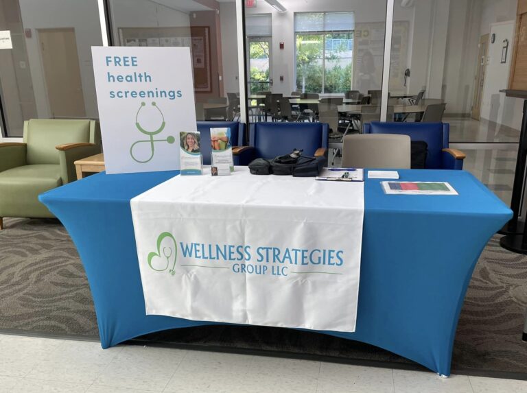 This is a photograph of Andrea Bendig's Wellness Strategies Group Booth.